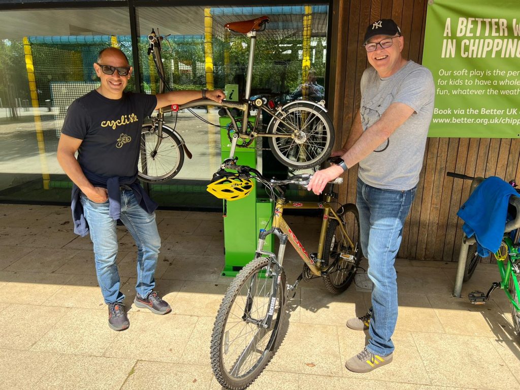 Cllr Mark Walker and a resident with the new bike repair station at the leisure centre. 